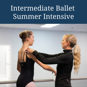 Mrs. Heidi giving a correction to a Ballet 3 student in class