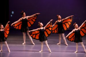 Ballet levels 2 & 3 performing in Gulf Coast Ballet Theater's Cinderella as monarch butterflies.