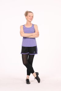 Adult beginner tap dancer ready for class. This picture shows you a great option on what to wear to a tap class.